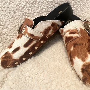 Real cowhide slides never worn
